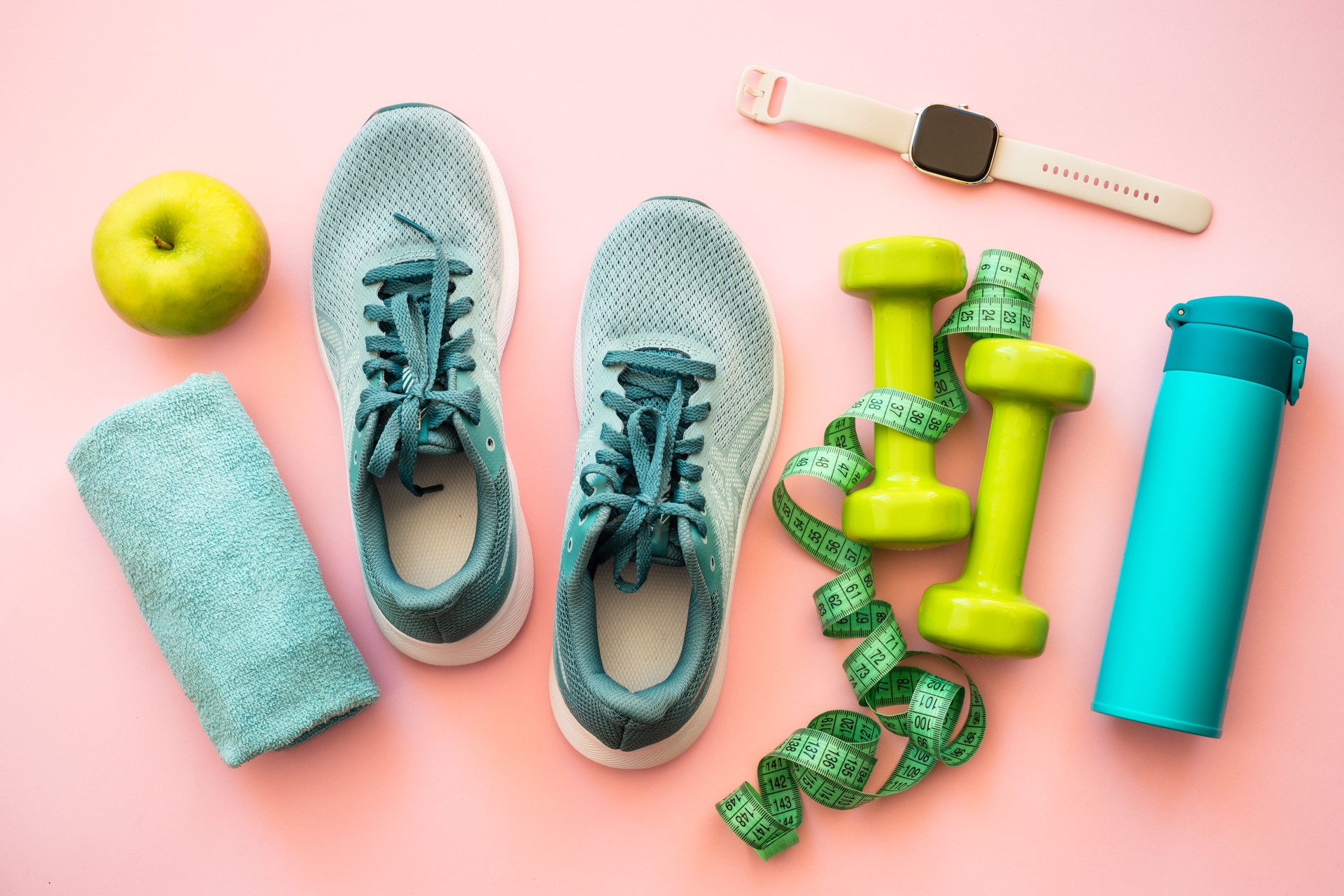 Healthy lifestyle concept. Fitness equipment and diet food.
